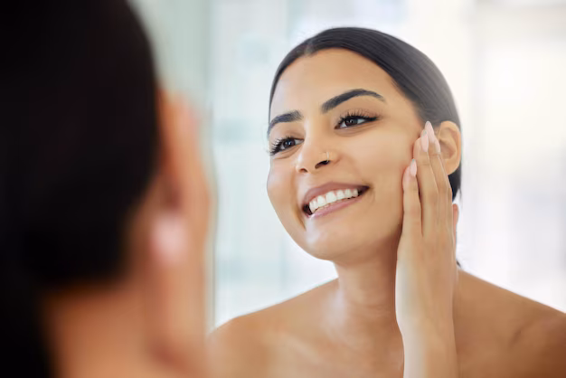 mirror-skincare-smile-with-face-woman-bathroom-home-morning-beauty-routine-cleaning-hygiene-grooming-with-reflection-happy-person-apartment-facial-dermatology_590464-514849